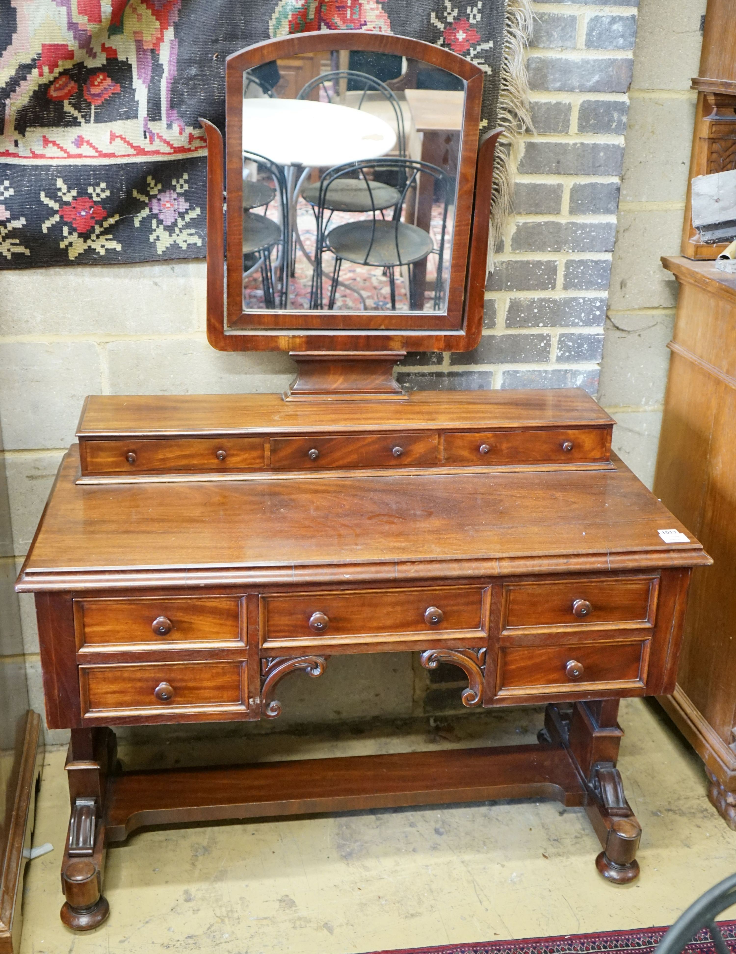 A Victorian mahogany kneehole dressing table, width 106cm, depth 55cm, height 144cm